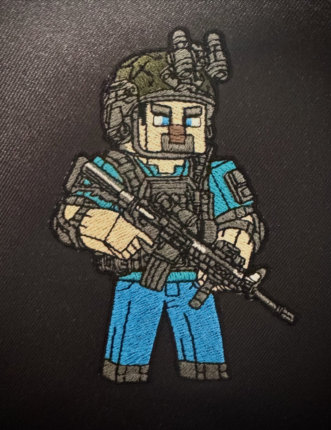 Pixel-style tactical character fully embroidered patch